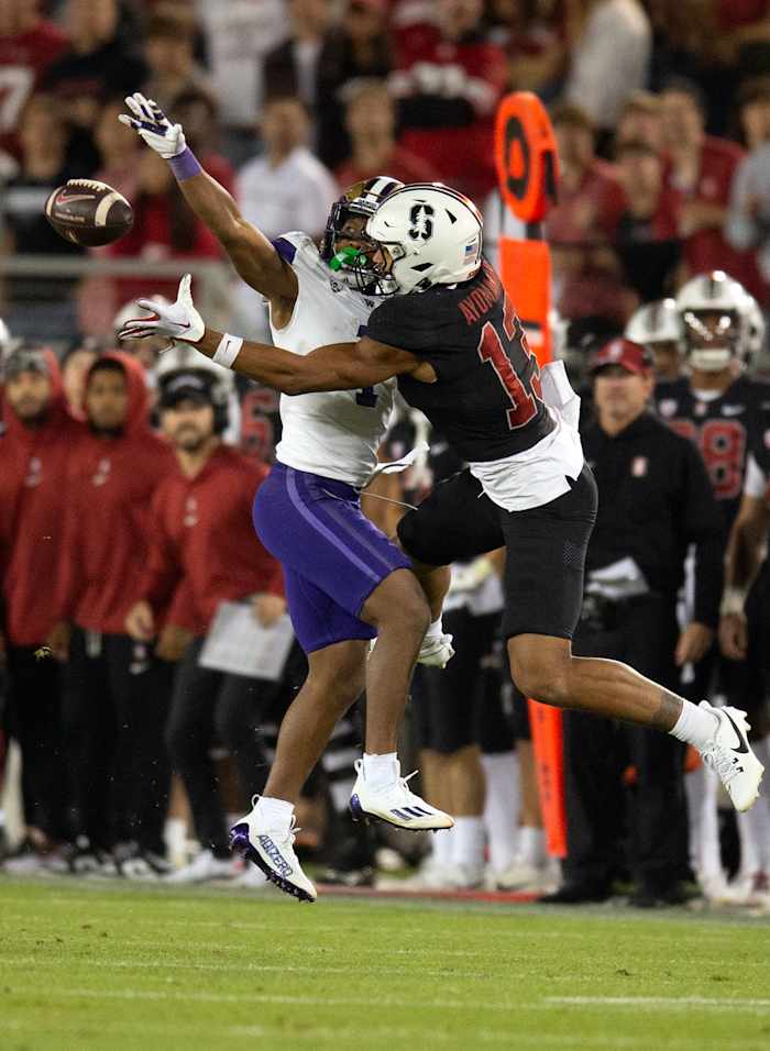 Washington Huskies cornerback Jabbar Muhammad breaks up a pass against the Stanford Cardinal.